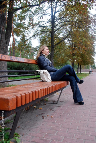 person sitting on bench © Viktoriia
