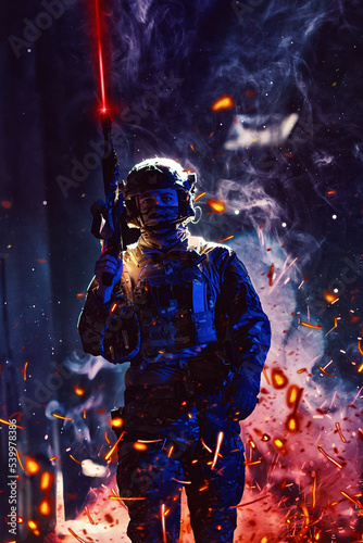 Army soldier in Combat Uniforms with an assault rifle and combat helmet night mission dark background. Blue and purple gel light effect.