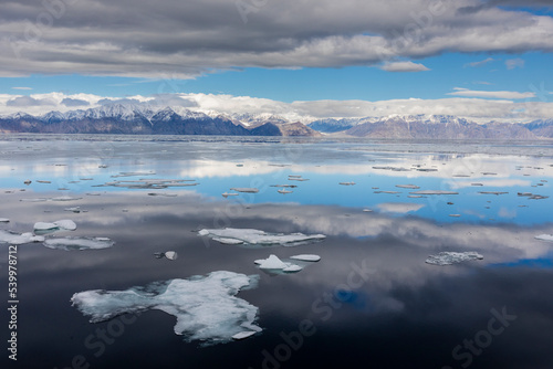 A view of the snow covered mountains surrounding Pond Inlet, Nunavut, Canada
