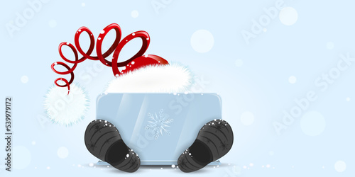 Little cute Santa Claus behind laptop. Sale, Christmas, Winter and technology concept