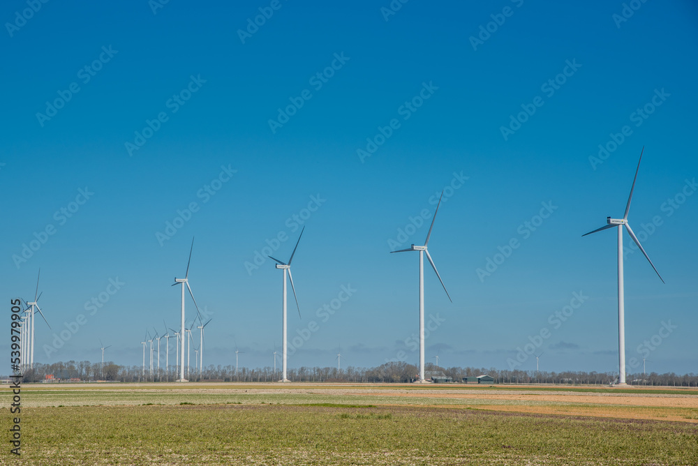 Middenmeer, Netherlands. June 2022. Wind turbines on the Dutch countryside.