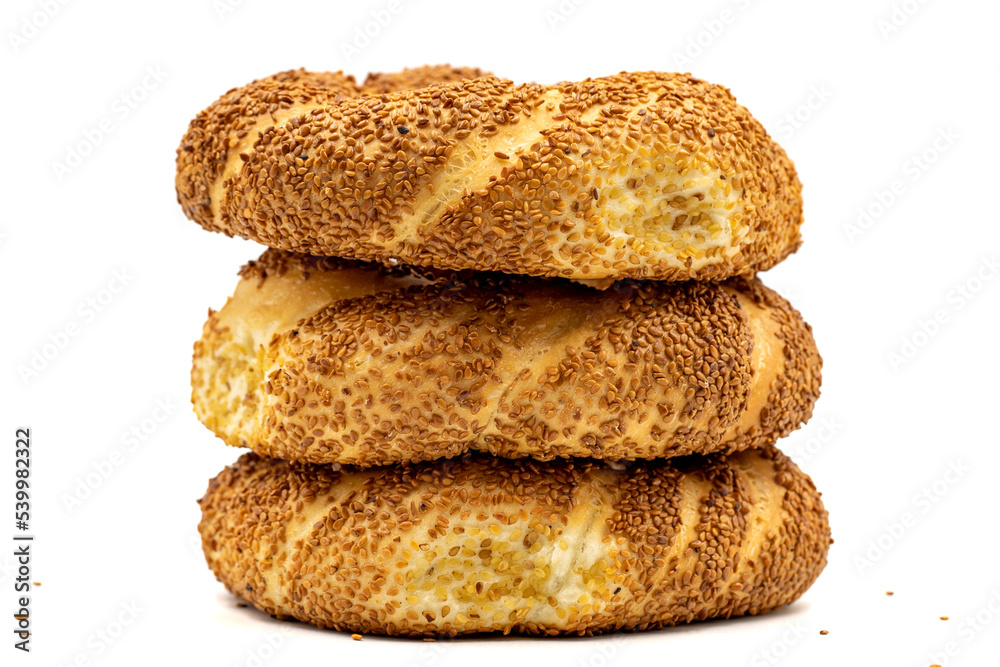Turkish bagel or gevrek. Traditional flavors. Bagel with sesame isolated on white background. close up