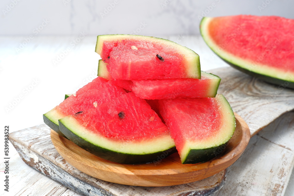Fresh ripe sliced watermelon on white background