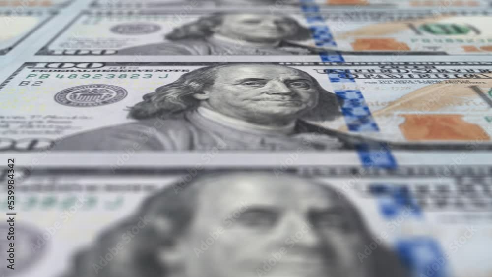 American 100 dollar banknote printing. Shallow deep of field footage. Business and Finance concepts. Seamless loopable animation. American 100 dollar banknote printing. Shallow deep of field footage. Business and Finance concepts. Seamless loopable animation.