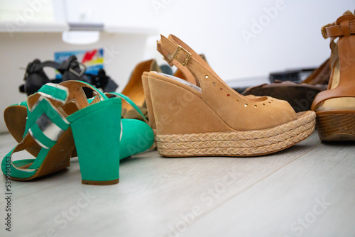 Group of shoes with high heels, color green and blue