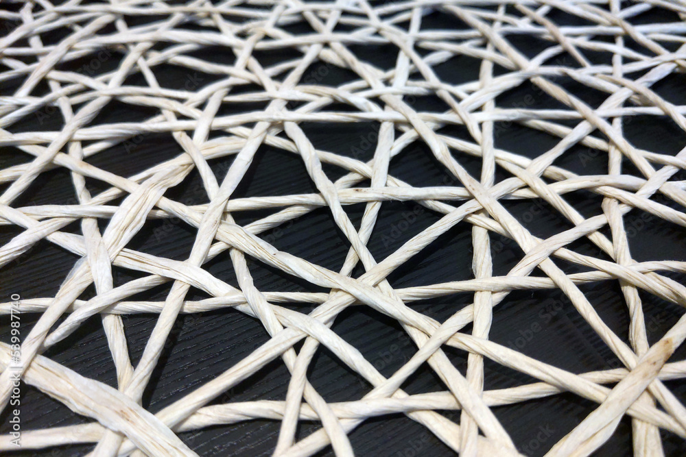 Beautiful woven tablecloth on the table, background. Beautiful woven tablecloth on the table, background.