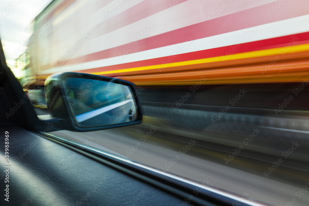 Driving fast on the highway. Highway background at sunset