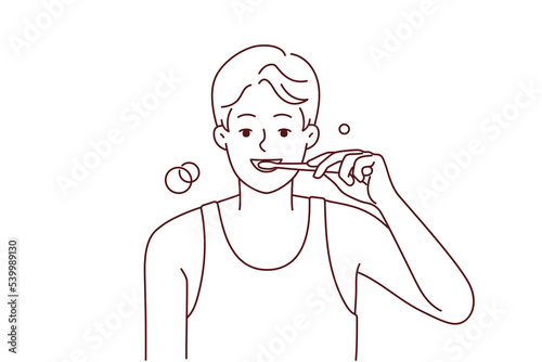 Smiling young man brushing teeth with toothbrush in morning. Happy guy do oral care daily routine in bathroom. Good habit. Vector illustration. 