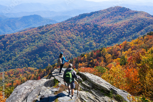 Fotografie, Tablou Couple hiking in the autumn mountains