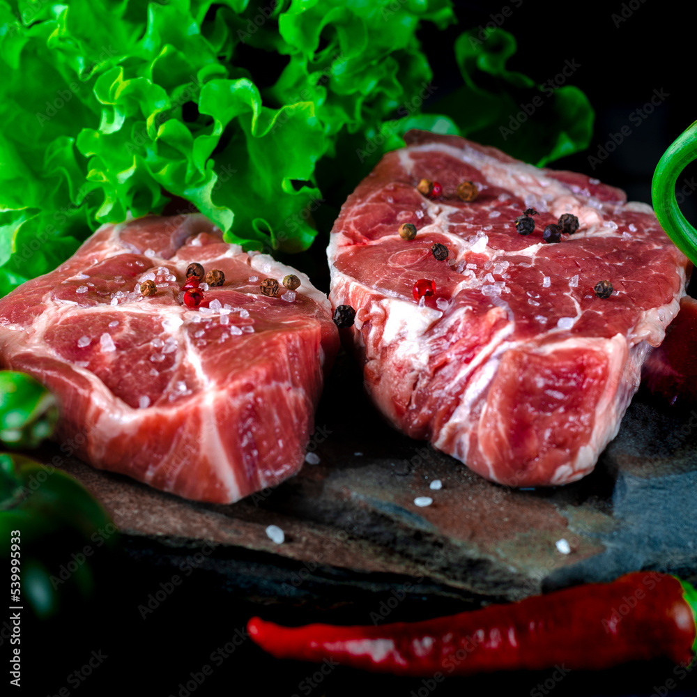 Meat set. Raw meat steaks with seasonings. Healthy eating