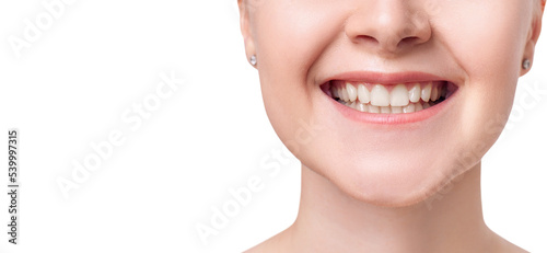 Perfect health teeth in wide beautiful smile.