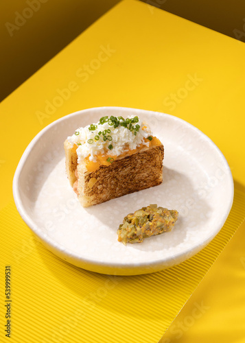 casserole with vegetables on a yellow background