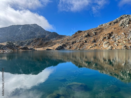 A crystal clear alpine lakes Laghi d'Orsirora during a beautiful autumn day in the mountainous area of the St. Gotthard Pass (Gotthardpass), Airolo - Canton of Ticino (Tessin), Switzerland (Schweiz)