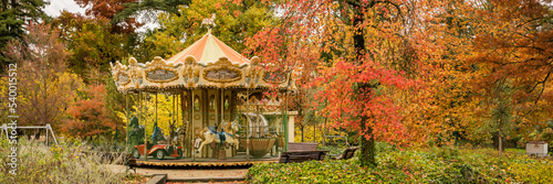 Old carousel in the Jardin Public park in Autumn in Bordeaux, France