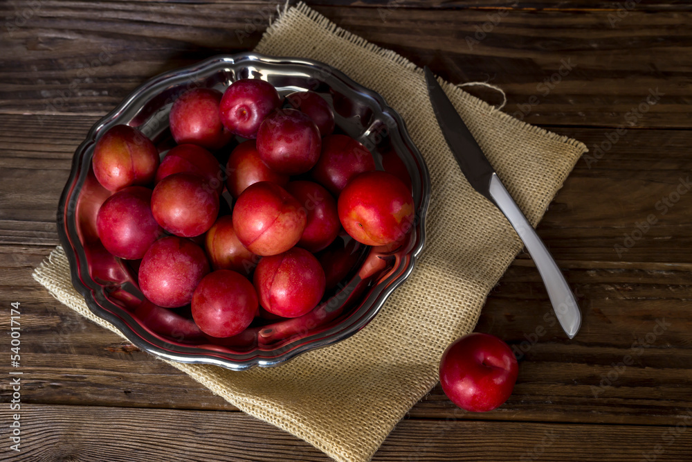 Ripe plums in a plate closeup Stock Photo Adobe Stock