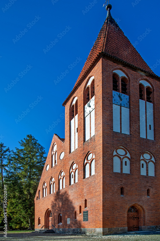 General view and architectural details of the Protestant temple, erected in 1905, now as the Catholic Church of Our Lady of Perpetual Help in the town of Spychowo in Masuria in Poland.