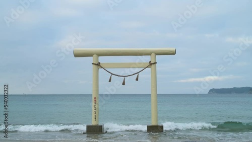 Temple torii gate at the beach in the morning, Chiba Prefecture, Japan photo