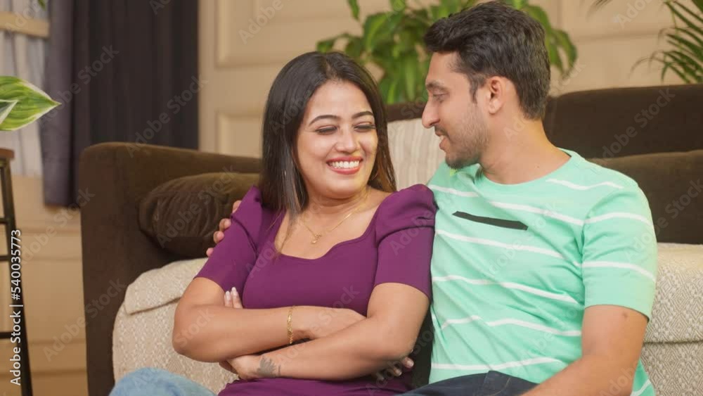 happy smiling couple busy talking each other during date at home - concept caring husband, newly married couples and relationship bonding happy smiling couple busy talking each other during date at home - concept caring husband, newly married couples and relationship bonding