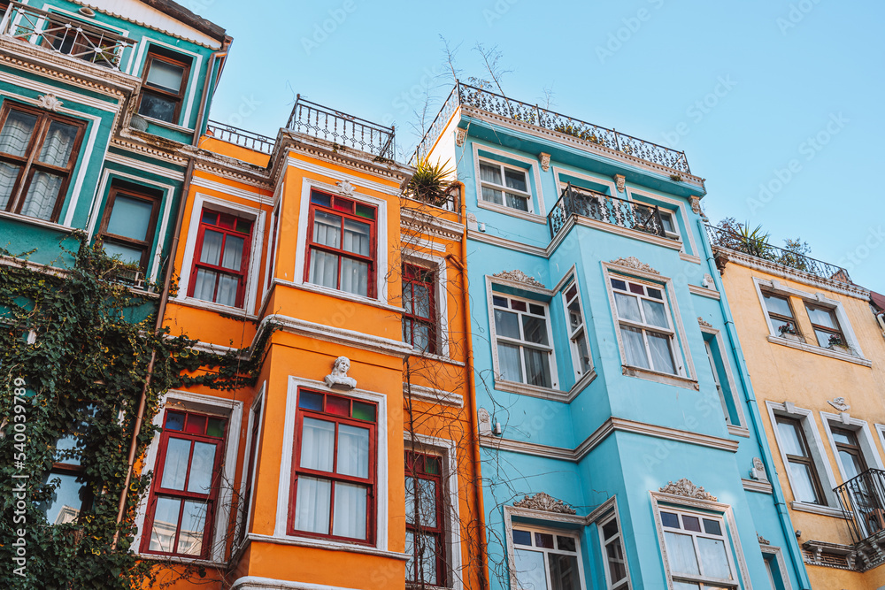 Colorful houses against blue sky Colorful houses against blue sky