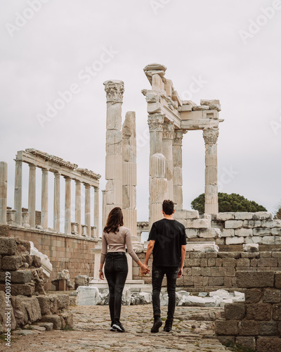 Couple admiring ancient Greek ruins