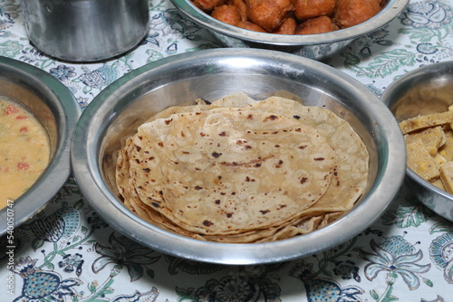 chapathi indian bread variety in a bowl photo