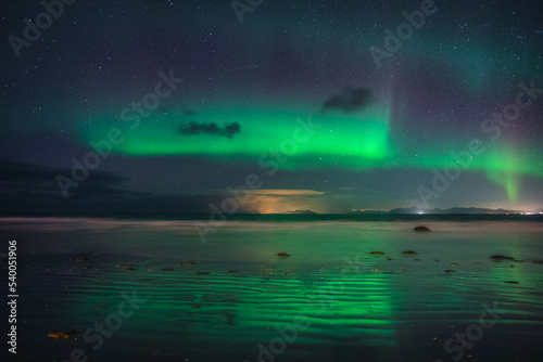The northern lights captured in the Lofoten Islands in northern Norway. © PawelUchorczak