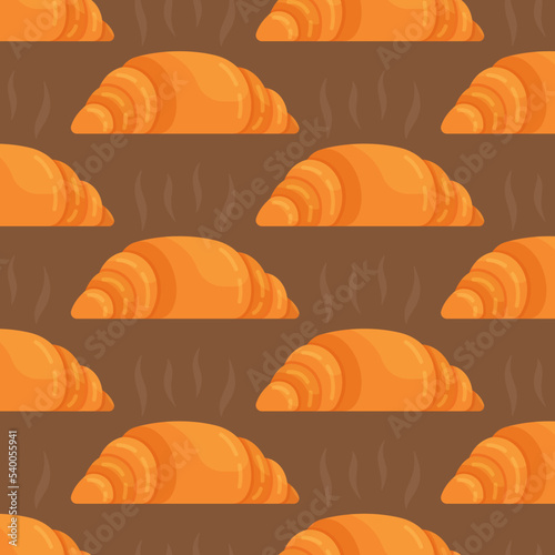 A pattern of crispy croissants on a brown background. Breakfast. 