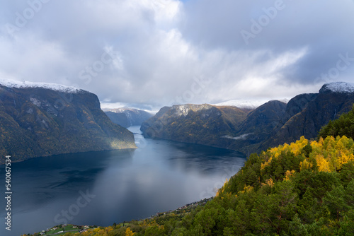 View of Aurlandsfjord and the surrounding snow mountains from the Stegastein viewing platform in fall. Aurlandsfjord is a fjord in Vestland county, Norway.