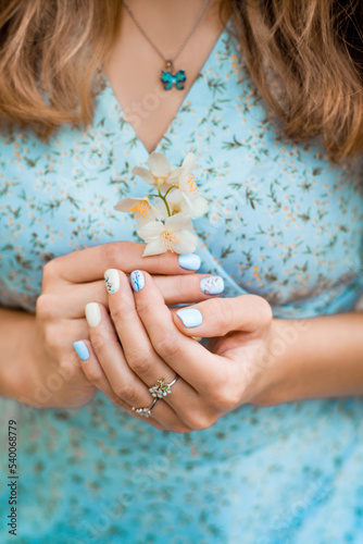 Female hands with flower macro