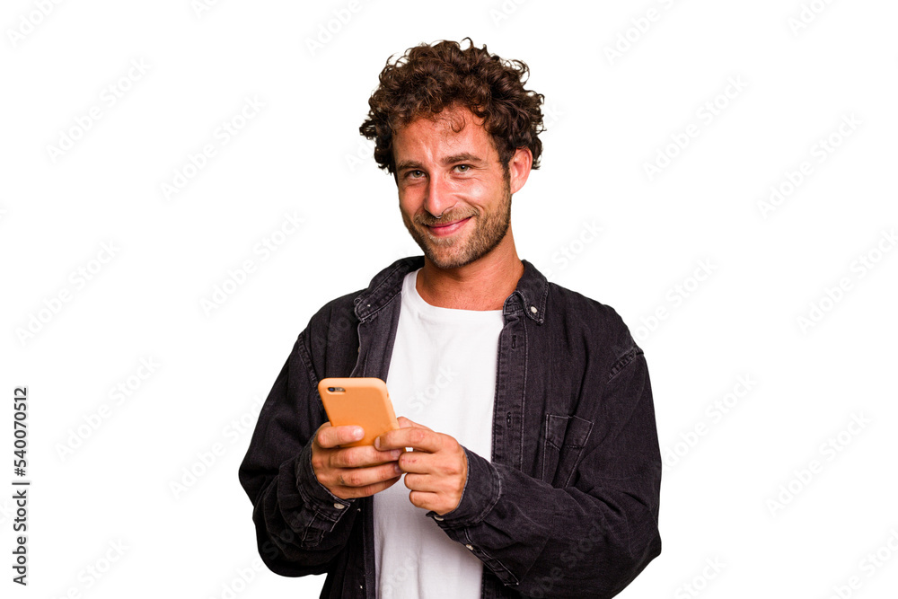 Young caucasian man using mobile phone isolated Young caucasian man using mobile phone isolated