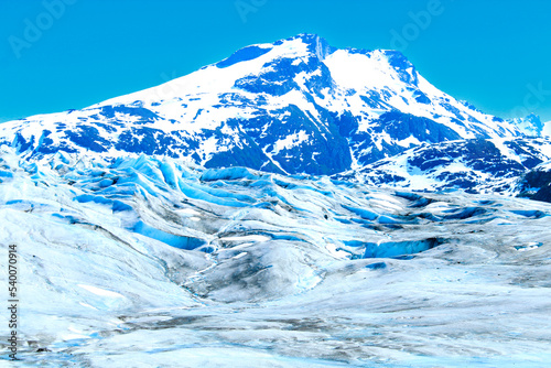 View of mountain peaks and icy landscape of Alaska's Mendenhall Glacier