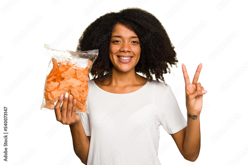 Young African american man holding crips isolated showing number two with fingers. Young African american man holding crips isolated showing number two with fingers.