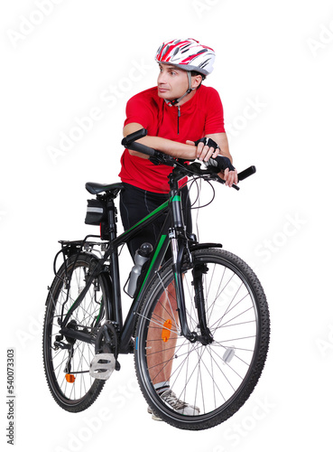 Fototapeta Naklejka Na Ścianę i Meble -  Leaning on his bicycle cyclist looking to the side