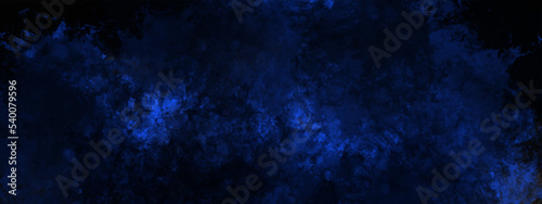 dark blue background texture with black vignette in old vintage textured background.