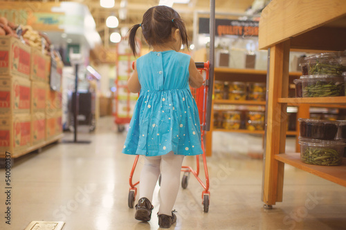 little girl at the grocery store