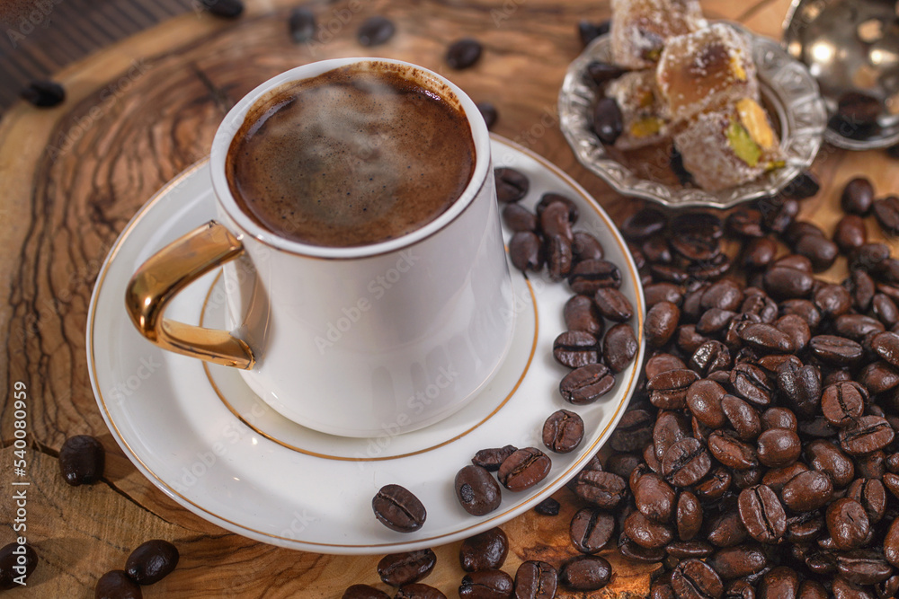 Fototapeta premium a cup of Turkish coffee, Turkish delight with pistachio