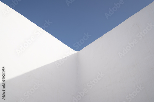 white wall with blue sky