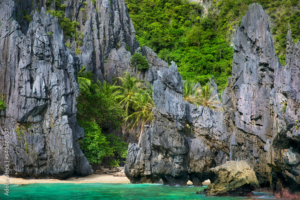 The Beach and Rocks outside the Secret Lagoon on Miniloc Island in the El Nido Archipelago, Palawan, Philippines