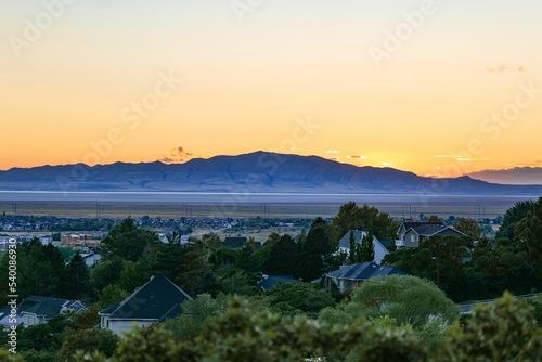 Scenic view of a sunset at the Great Salt lake with Antelope island in the background photo