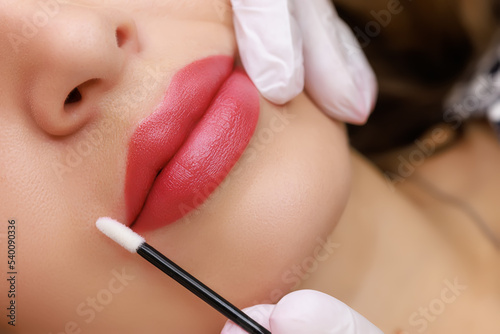 result after permanent make-up of model lips
