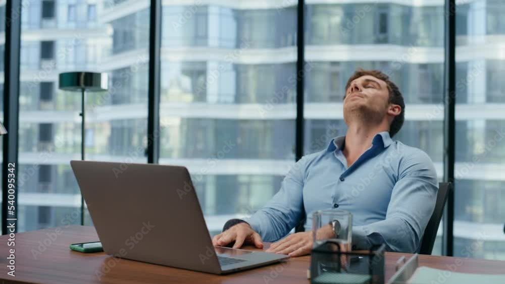 Upset exhausted director tired of work routine closeup. Manager leaning chair Upset exhausted director tired of work routine closeup. Manager leaning chair