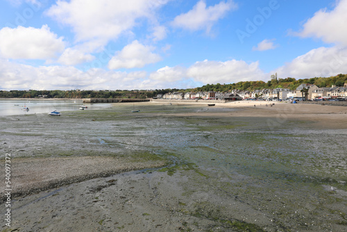 beached boats stranded during low tide