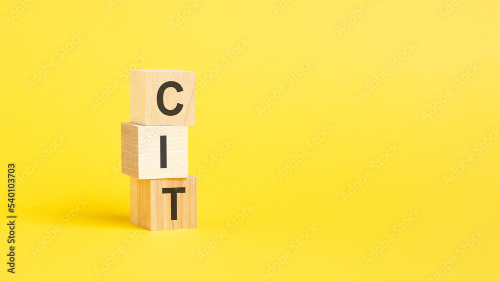 CIT symbol. beautiful yellow background. business concept. copy space. CIT symbol. beautiful yellow background. business concept. copy space.