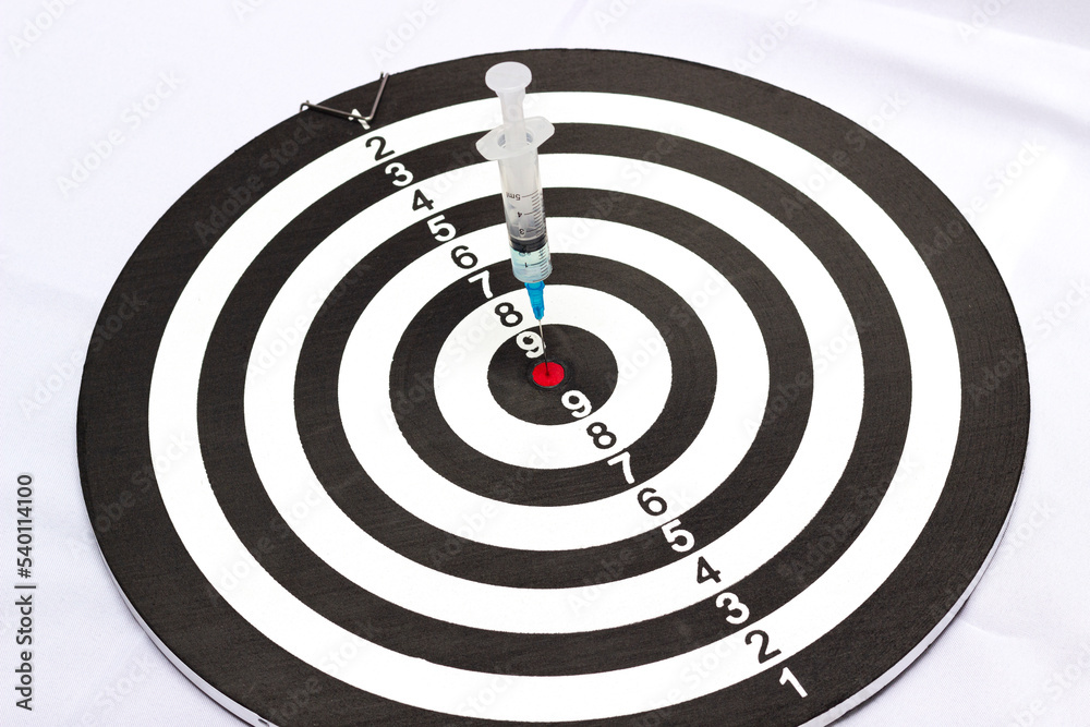 syringe and target, treatment and painkiller, the concept of accurate, correct and fast treatment syringe and target, treatment and painkiller, the concept of accurate, correct and fast treatment