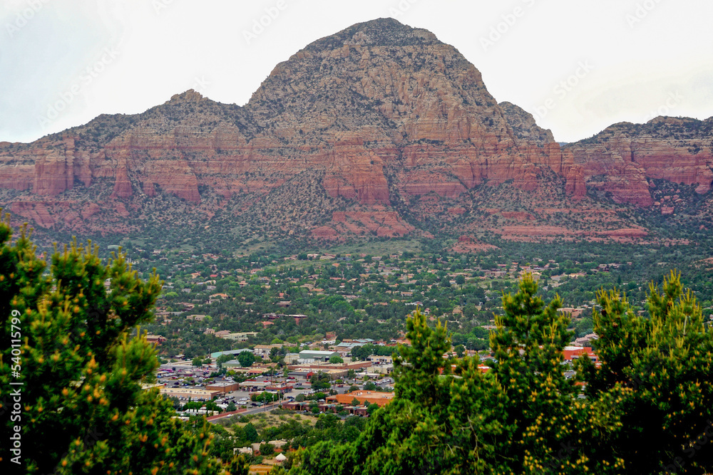 Sedona, Arizona: View of the red rocks and the town of Sedona from Airport Mesa (Table Top Mountain), on a cloudy day. Sedona, Arizona: View of the red rocks and the town of Sedona from Airport Mesa (Table Top Mountain), on a cloudy day.