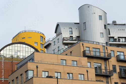 Yellow, Brown, and Silver Buildings Stacked in London