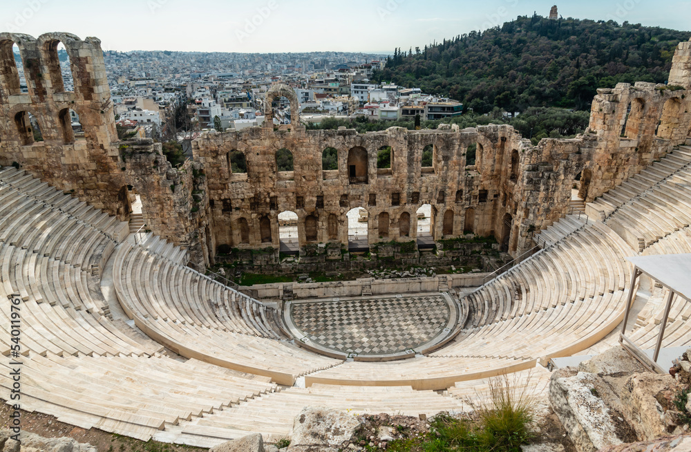 ancient theater on the background of Athens Greece