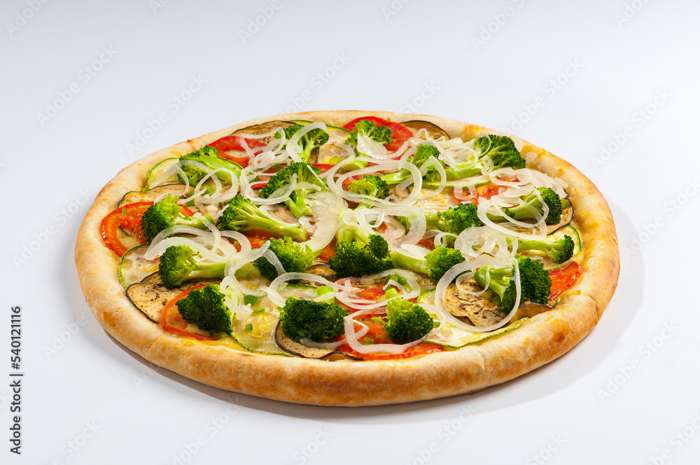 Vegetarian Pizza, with tomato sauce, broccoli, tomatoes, zucchini, eggplant and onion rings