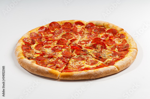 .Pepperoni pizza on white background. Copy space. Selective focus