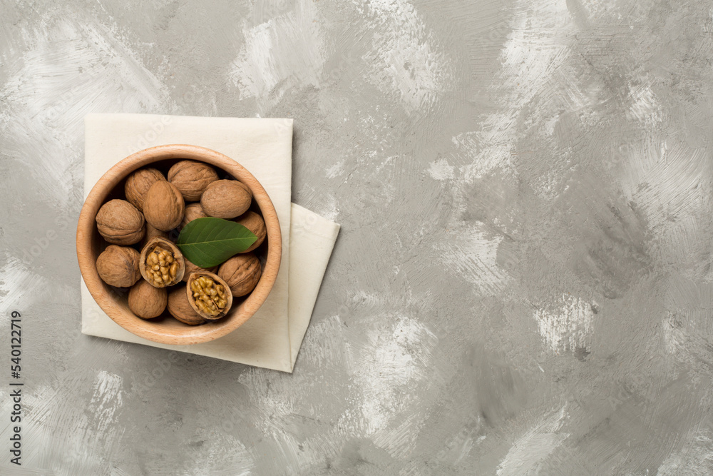 Fresh walnuts on wooden background, top view Fresh walnuts on wooden background, top view